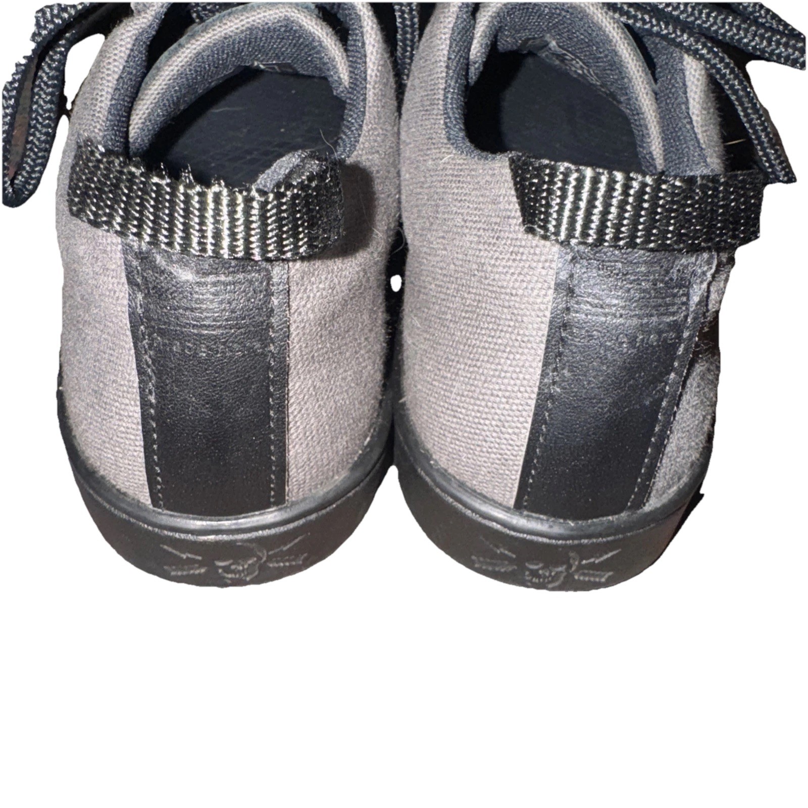 Gray Woobies Tactical Mod-1 canvas shoes with black swoosh logo, black laces, and adjustable strap across the back.