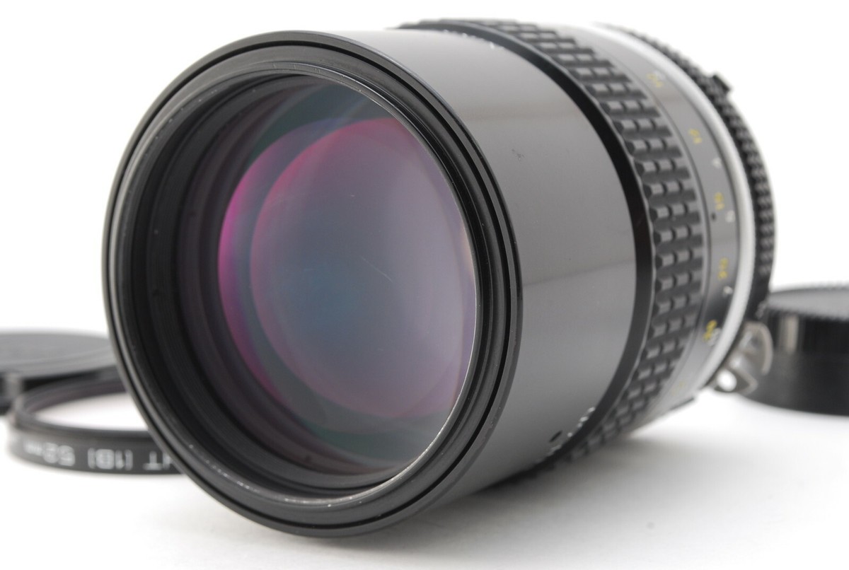 Nikon Ai NIKKOR 135mm F/2.8 Lens with Filter & F/R Caps from Japan