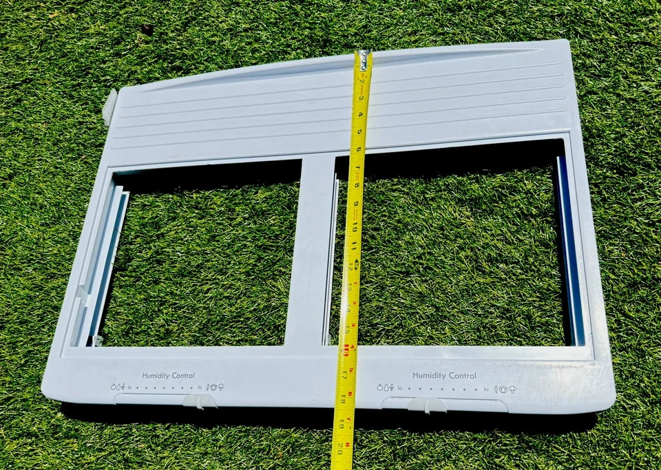 Marco de cubierta para refrigerador Kenmore # 3011492300 del modelo # 111.60512912 Foto 3 de 4