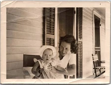 Vintage Snapshot Smiling Woman Holding Baby 1950s
