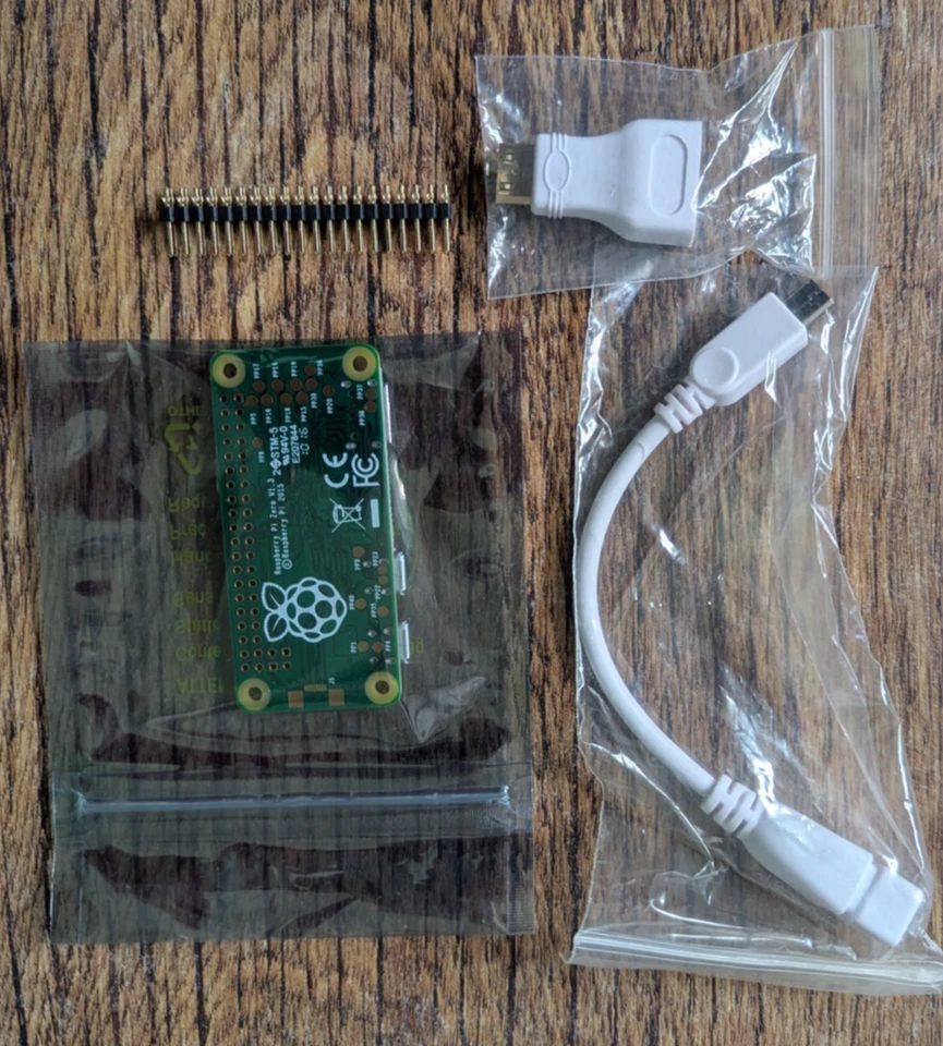 Raspberry Pi Zero W v1.1 with adapters (USB and HDMI) and headers - Image 3 of 3
