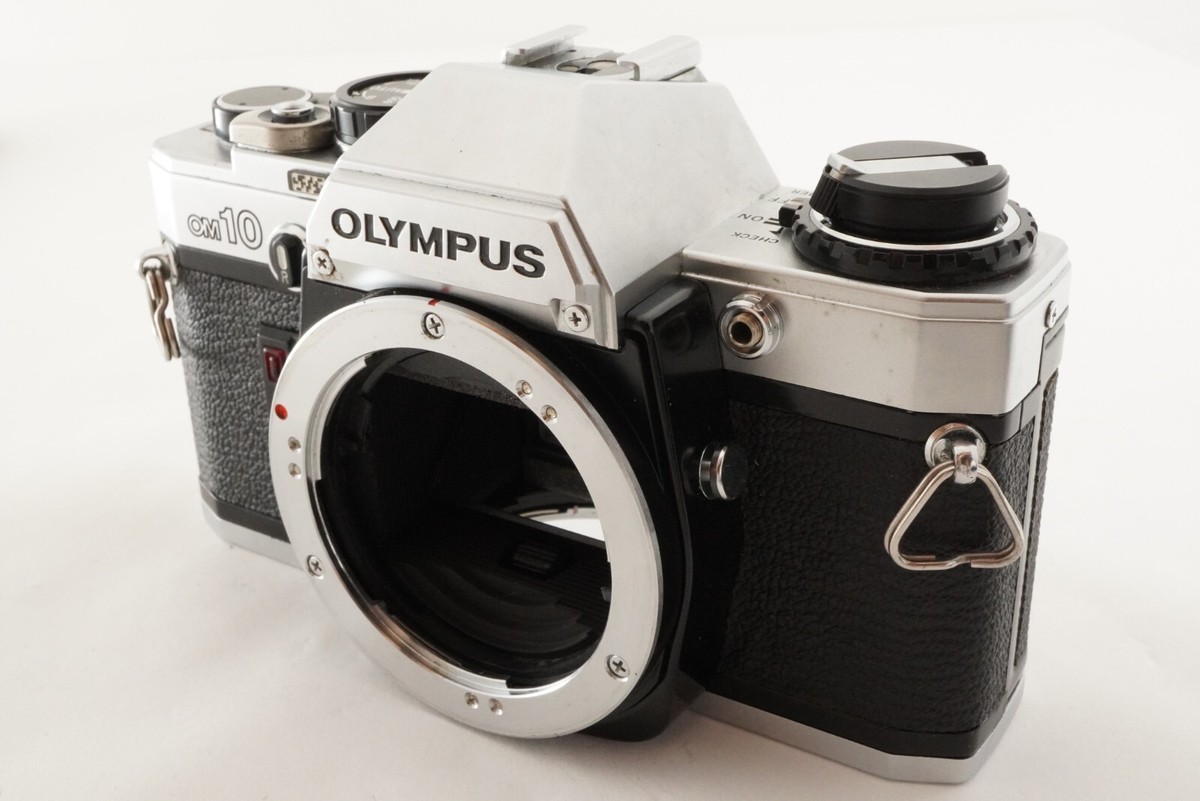 New Light Seals OLYMPUS OM10 + MANUAL ADAPTER + 50mm F1.4 New Light Seals OLYMPUS OM10 + MANUAL ADAPTER + 50mm F1.4
