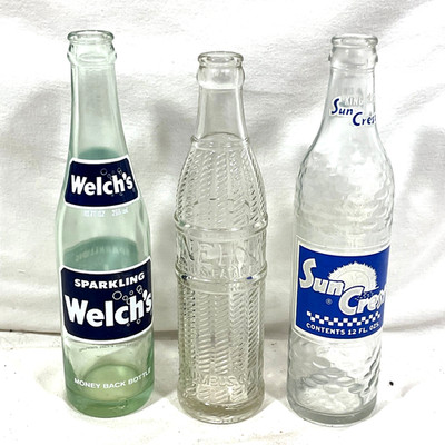 Lot Of 3 Vintage Glass Soda Bottles, WELCH S 10 oz, SUN CREST 12 oz, NEHI 9 oz.