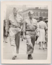 1940s Black White Photo Two Army Soldiers Walking Thru Town