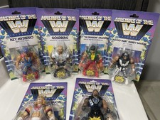 WWE Masters of The Universe Macho Man Randy Savage Roman Riegns  Rey Mysterio