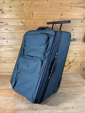 Samsonite 550 Slanted Four-Wheel W Retractrable Handle Dark Green 26” x 17” x 13