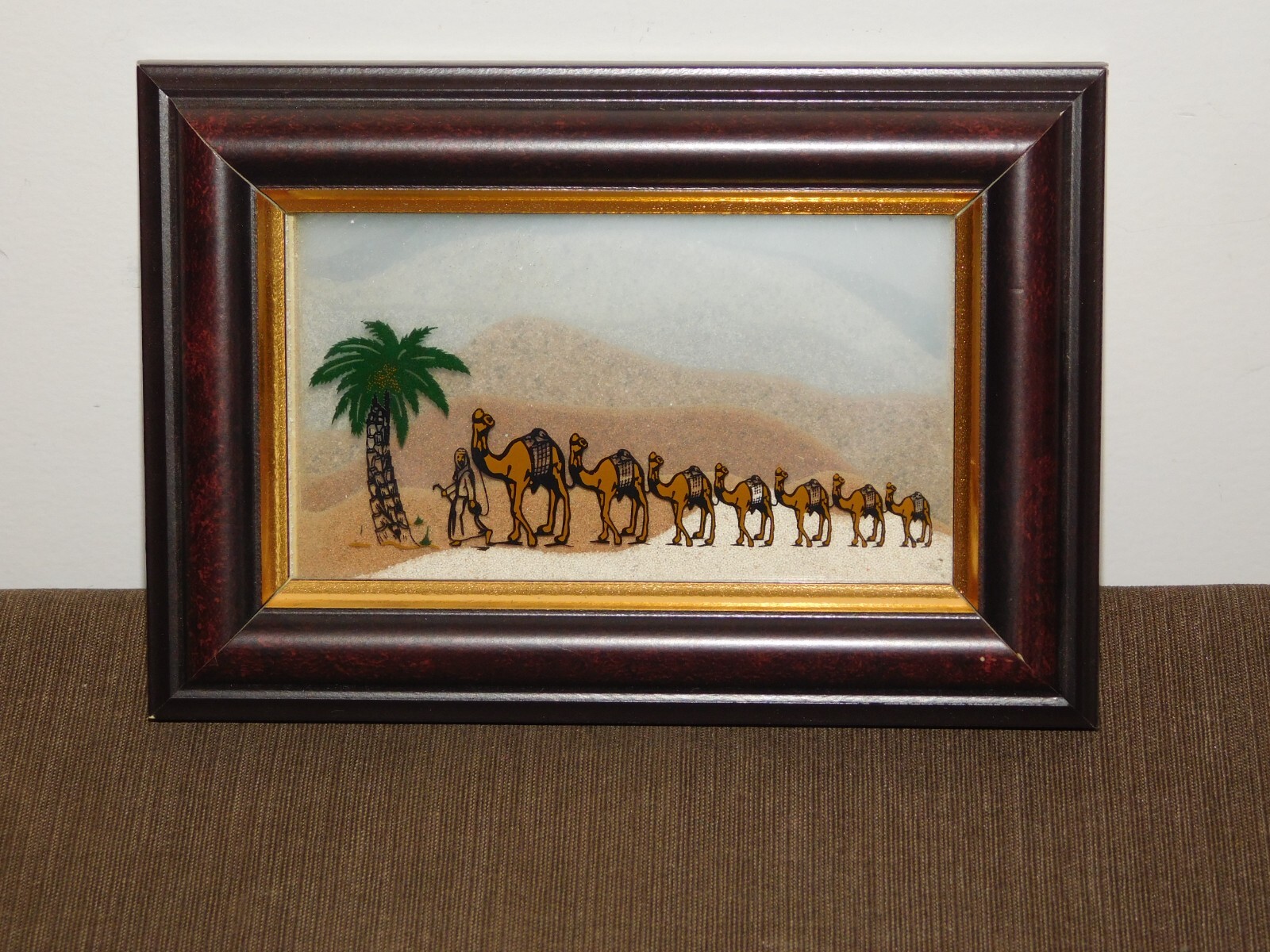 VINTAGE HANDMADE  7" X 5" U. A. E. SAND FROM 7 EMIRATES CAMELS FRAMED SOUVENIR
