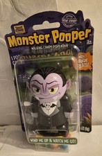 TREAT STREET Monster POOPER DRACULA CANDY Dispenser and glow dark earring set