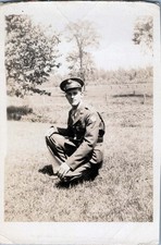 WW2 Photo of Soldier Crouching in Field