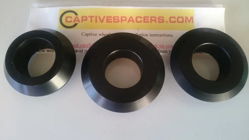 APRILIA TUONO 1100 FACTORY. CAPTIVE WHEEL SPACERS ANODISED BLACK