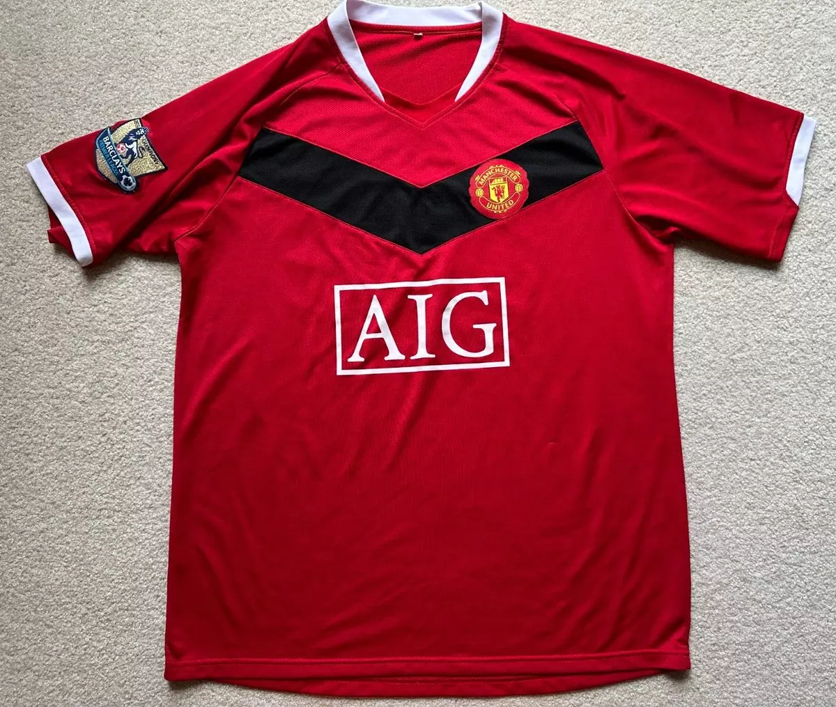 aig man utd shirt