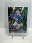 2025 Panini Select Jaxson Dart - Premier Level#193 Black Green Shock Prizm (RC)