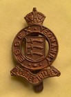 BRASS FLATTED QVC CROWN ESSEX YEOMANRY 1916-18 CAP BADGE - C733