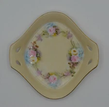 R.S. Prussia ? German China Trinket dish with gold rim and handles Mint