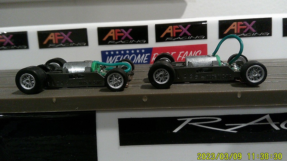 AFX Racing H.O. Scale Mega G+ 1.5 Narrow Chassis with Silver Rims & Spinners  