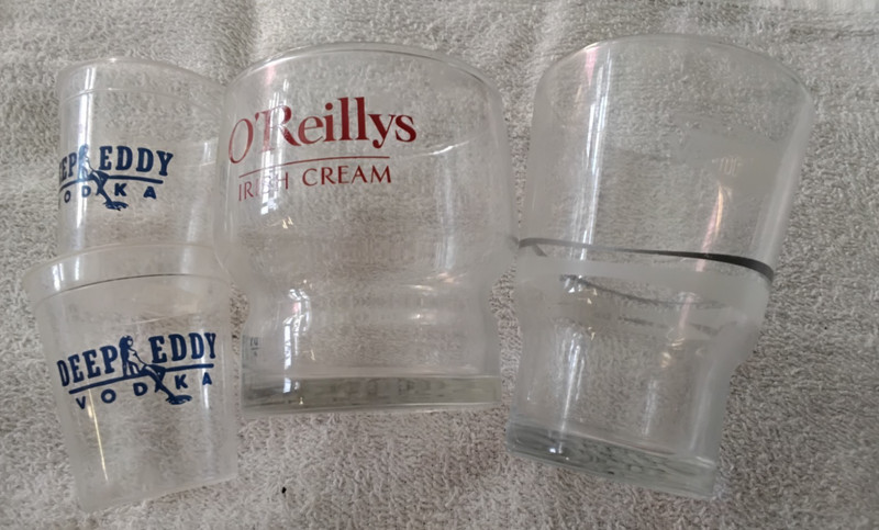 4 NICE LIQUER / SHOT GLASSES   O'REILLYS  NIEHOFF'S   VAIHINGER  DEEP EDDY VODKA
