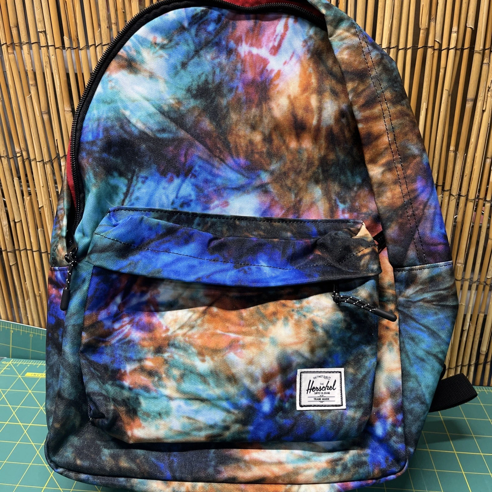 NWT multi colored dye Backpack Double Zip Front Pocket Adjustable Straps Unisex
Opens in a new windo