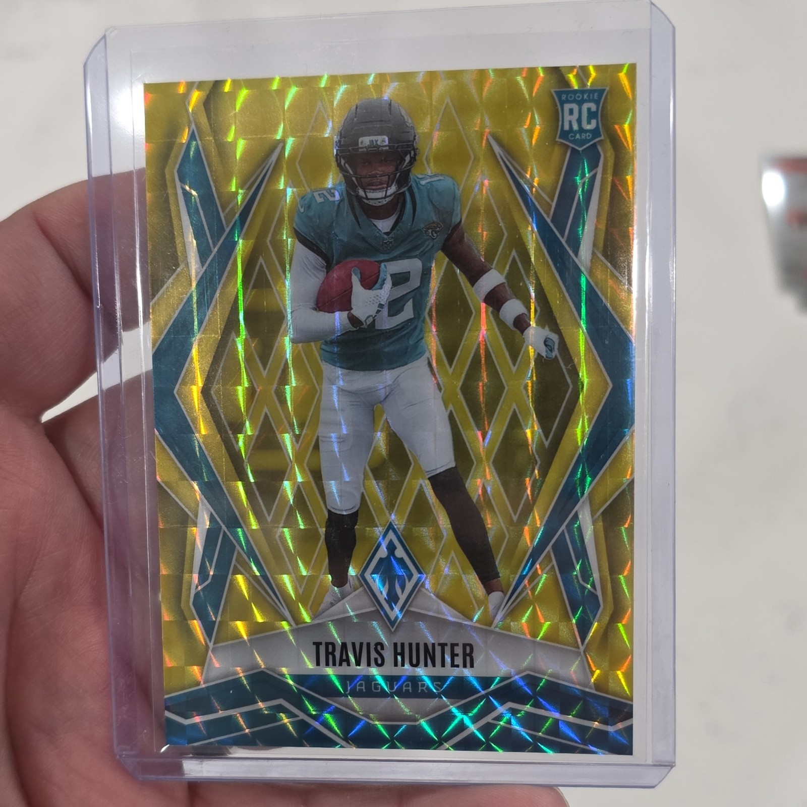 2025 Panini Phoenix Travis Hunter Jaguars Rookie Yellow Pyramids #157 /185