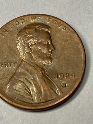 1984 D error penny, nice array of gas bubbles obverse under D and reverse