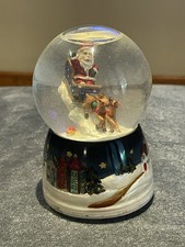SNOW GLOBE MUSIC BOX THAT PLAYS   SANTA CLAUS IS COMING TO TOWN  