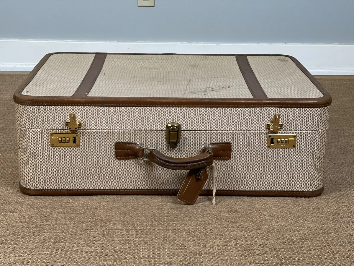 Vintage Louis Vuitton hard-sided suitcase