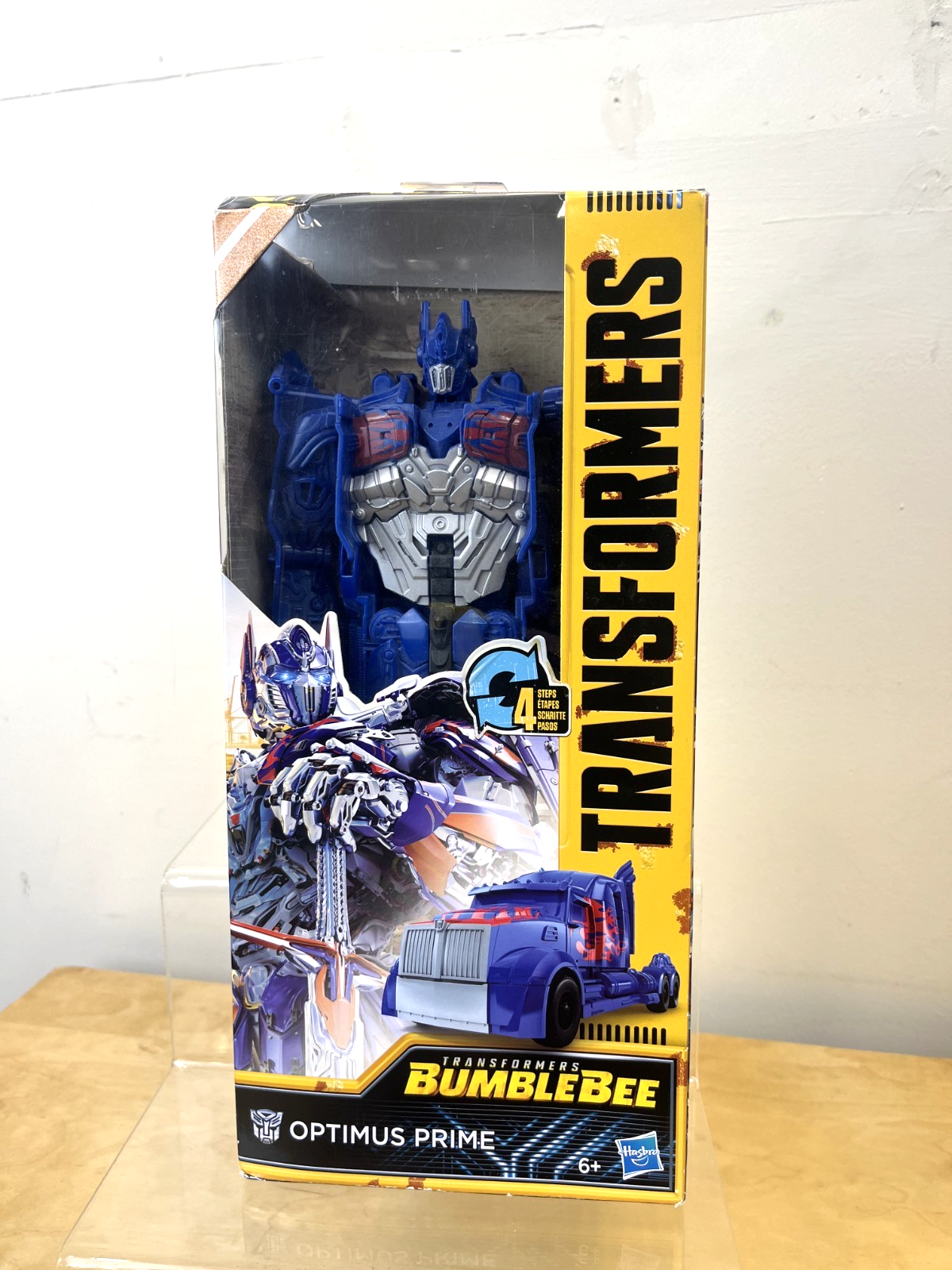 Brand new. Authentic Hasbro Transformers Optimus Prime. Titan 4 step changer.