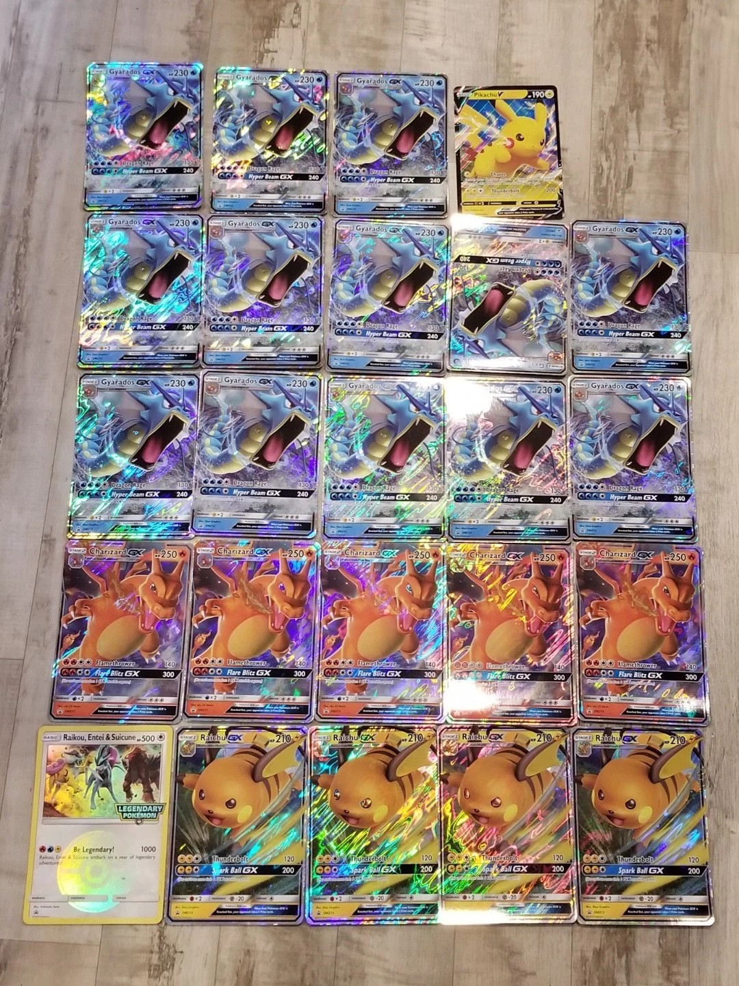Pokemon Card Jumbo Lot Of 24 Charizard Gyrados Raichu Pikachu Entei Hidden Fates