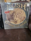 RUSH- CARESS OF STEEL** SEALED** VINYL