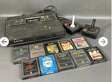 Atari 2600 Game Console Controllers  10 Games Untested No Power Cord Parts