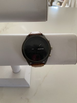 Unlisted Kenneth Cole UL1288 A126-14. Large black on black face, working watch