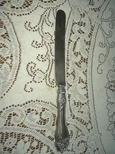 Antique table knife silver plate Fred Brodegaard & Co Roses pattern 1940's