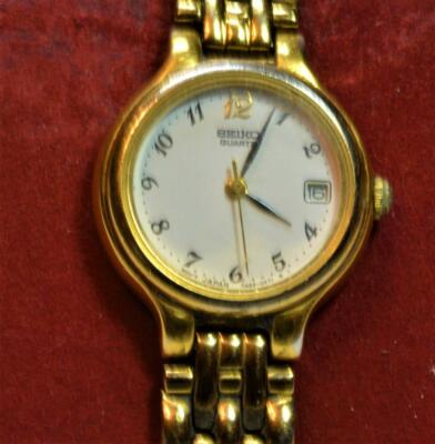 Original Seiko Women Quartz gold tone bracelet date Water res