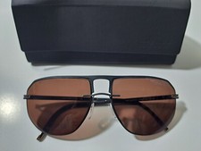 Sunglasses Silhouette 8704 Titan Metallic Oval Sunglasses Glasses A 4