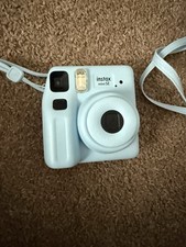 Fujifilm Instax Mini SE Blue Instant Camera With Matching Protective Case