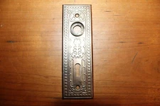 One Victorian Antique Ornate Brass Plated Pressed Steel Escutcheon B-44