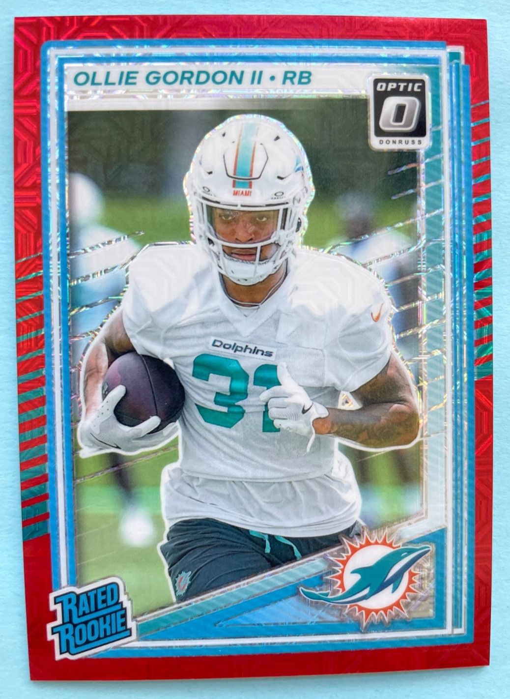 2025 Panini Optic Football Red Mojo Prizm #218 Ollie Gordon Rated Rookie