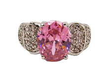 Pink oval cubic zirconia ring with round clear cz stones on each side Size 8