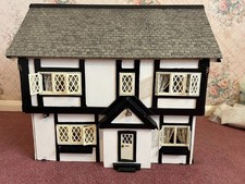 Complete dolls' houses pre-owned