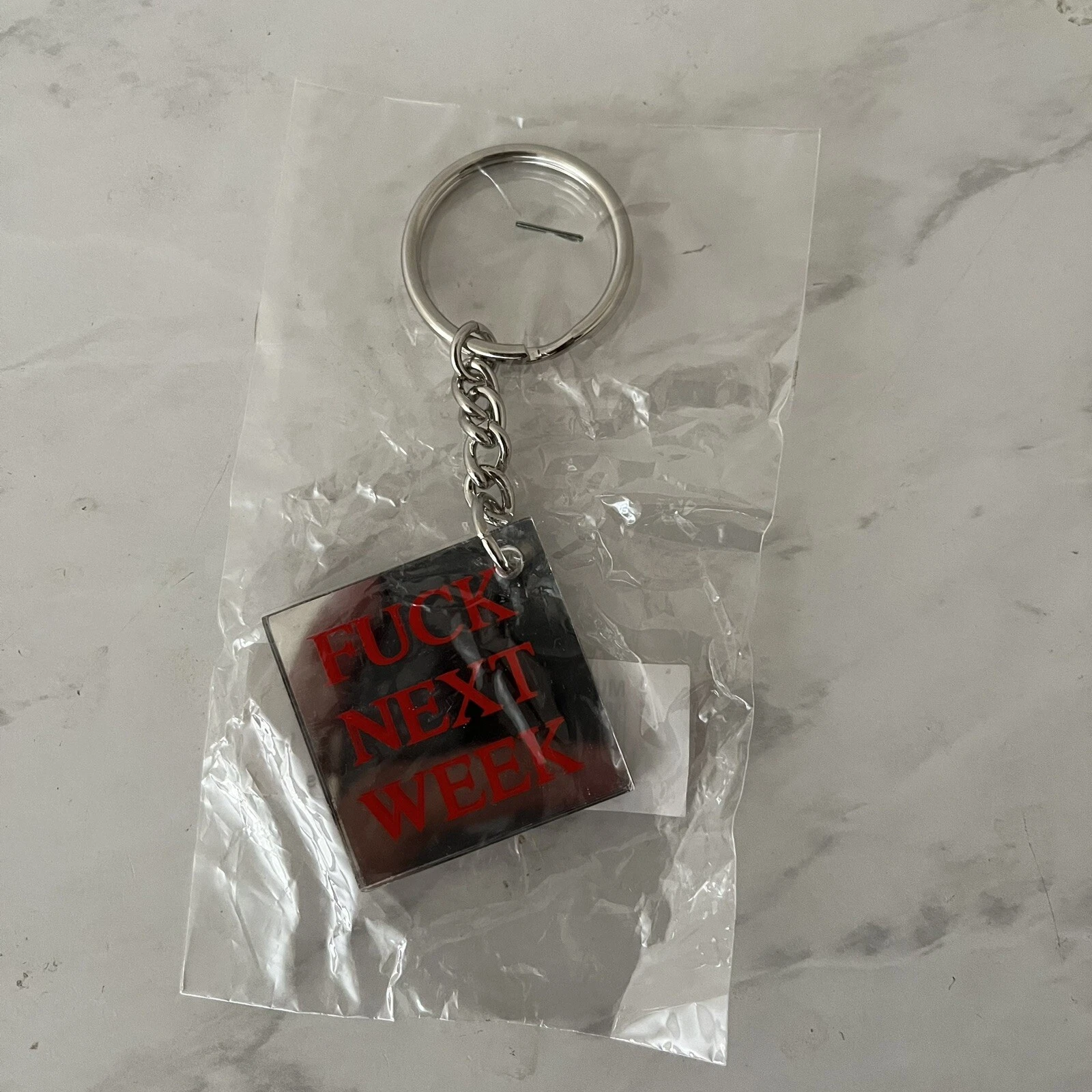 Porte clés miroir Supreme New York F UCK LA SEMAINE PROCHAINE scellé dans un sac. Rare.