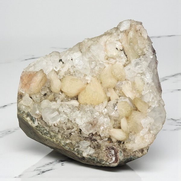 Druse of apophyllite and stilbite from India.