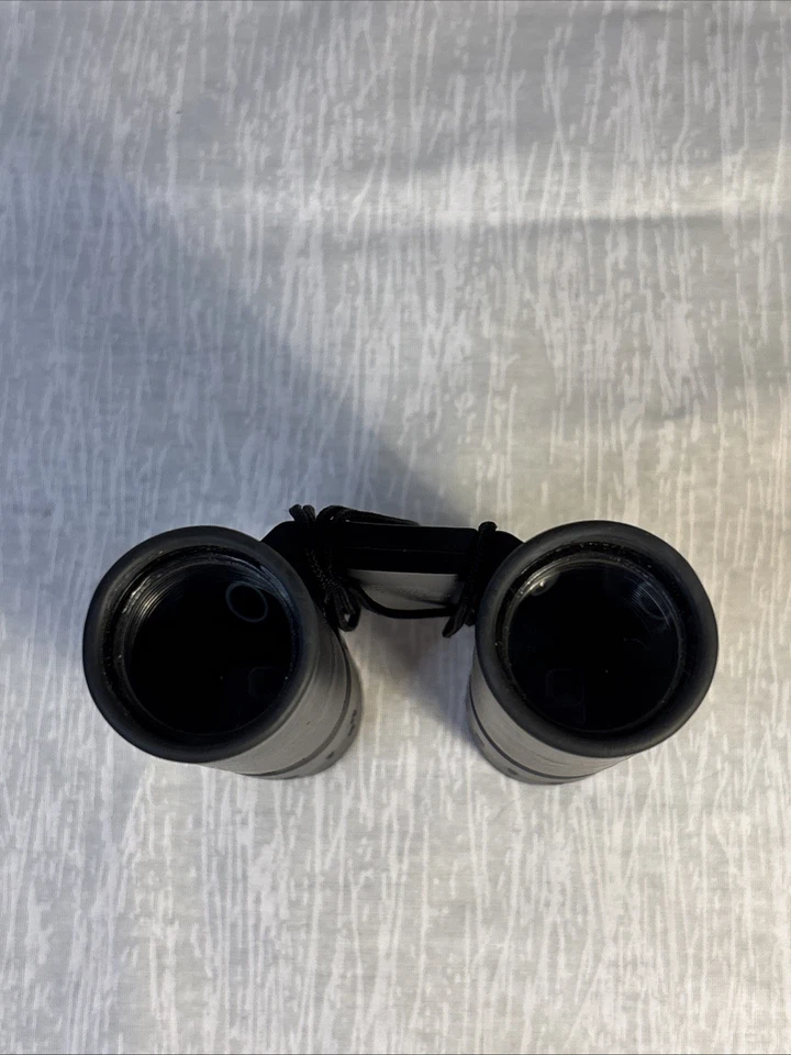 Tasco Black Binoculars With Case, Lens Cleaning Cloth And Owners Manual. - Image 4 of 4