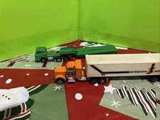 Pair Semi- Trucks Hong Kong 1:64