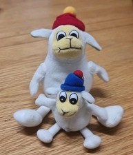 Two Sheep Farther And Son In Red And Blue Hats Z