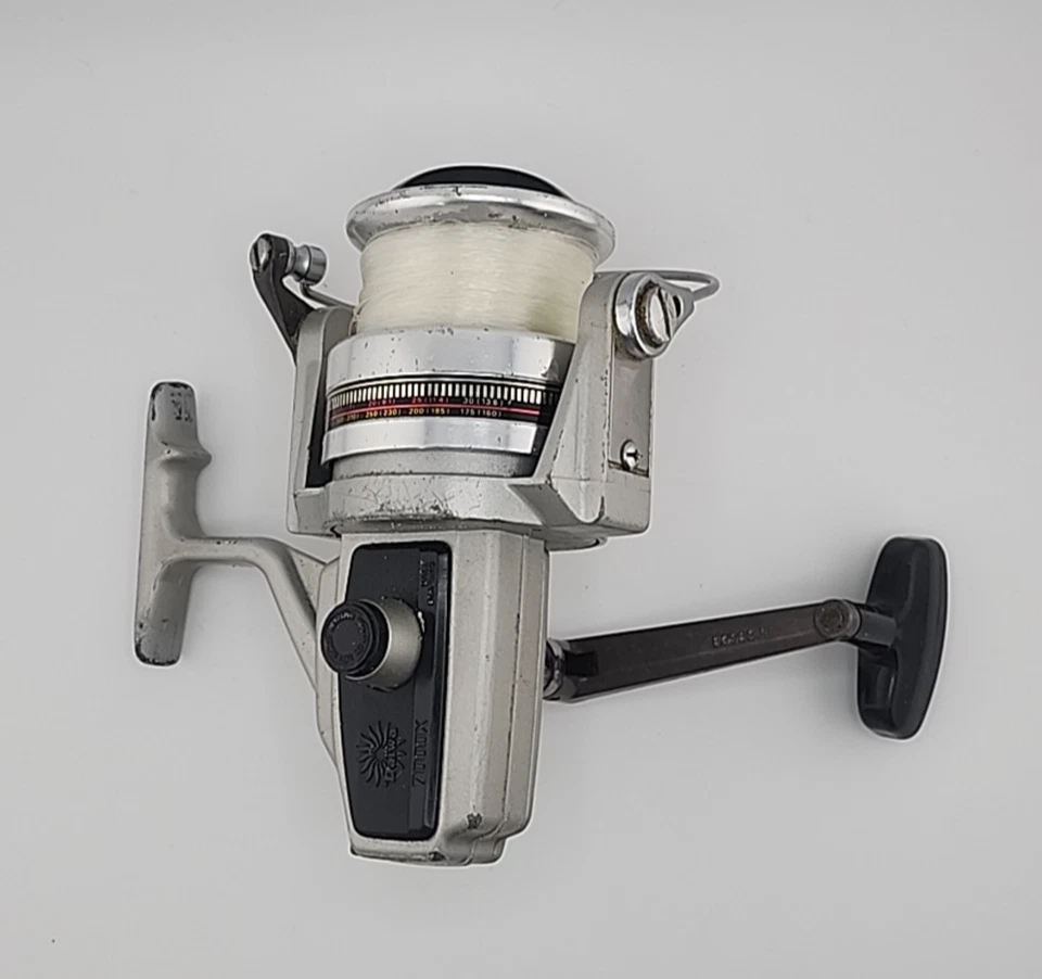 Carrete giratorio de agua salada Daiwa vintage - Modelo 7000X serie plateada Foto 2 de 4