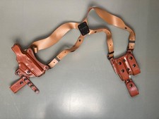 Aker leather tan Glock shoulder holster with double Mag holder. Good condition.