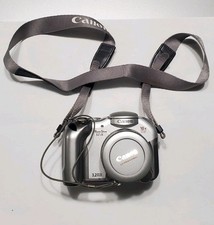 Canon PowerShot S1 Is Silver 3.2MP Camera with 10x Optical Zoom ( Not Working)