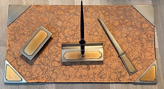 A 5-piece Sheaffer Lifetime fountain pen writing set — Sheaffer's 'Lifetime' guarantee was a bold flex in its era, and this set still carries that gravitas.