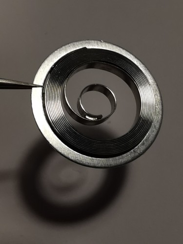 PIECES HORLOGERIE -RESSORT DE BARILLET -MAINSPRING -OMEGA 371