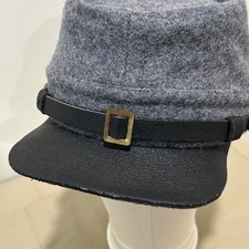 gray wool Civil War style kepi forage cap with a black leather