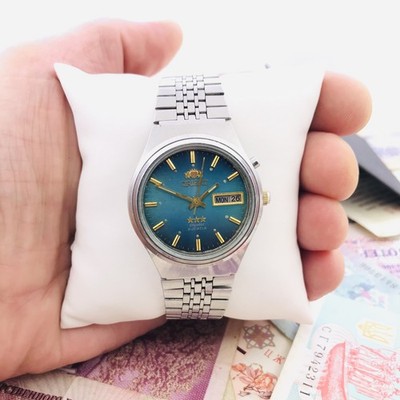 Orient Watch Crystal 3 Stars 21 Jewels Automatic Teal Dial Stainless Steel 1980s